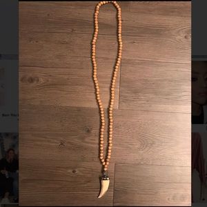 Wood beaded necklace with horn